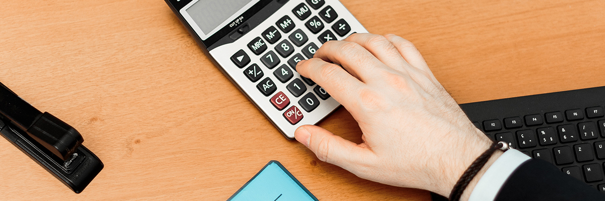 closeup of someone using a calculator