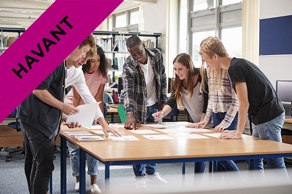 students collaborating around a table