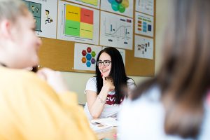 a student with their mates in class