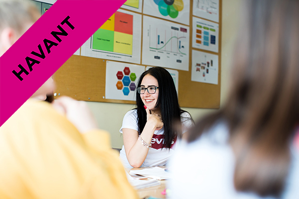 a student with their class mates in class