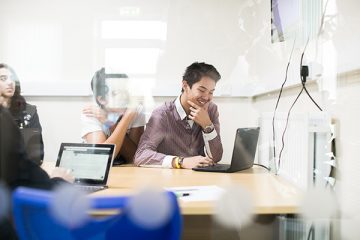 a man working at a laptop