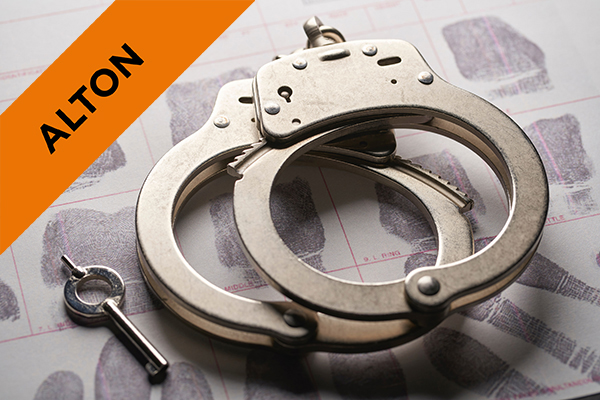 handcuffs resting on fingerprints