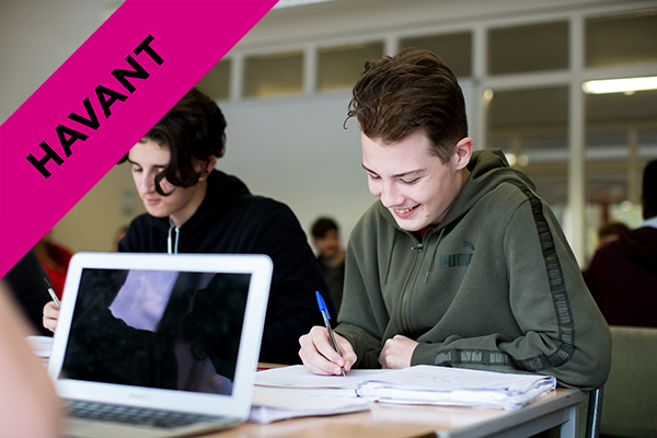 two students working together in class