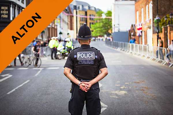 a policeman standing in a road