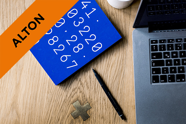 close up of numbers and a laptop