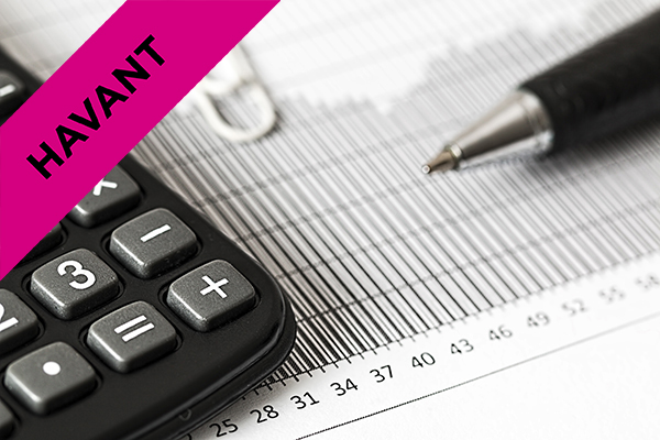 closeup of a calculator and pen