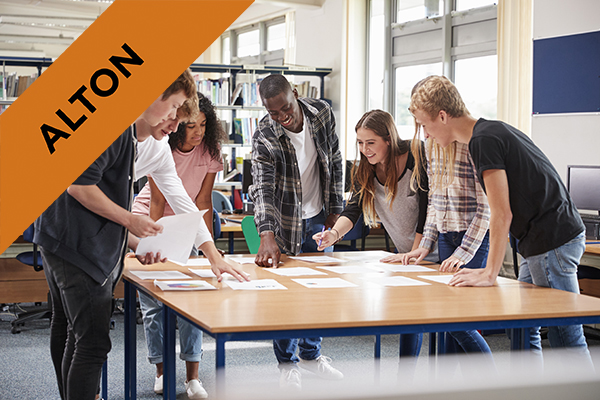 students collaborating around a table
