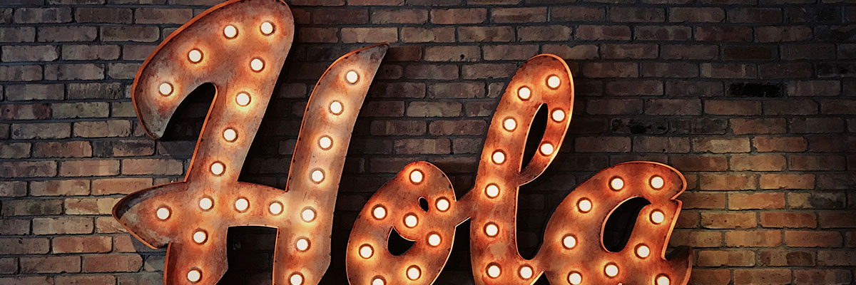 the word 'hola' in lights