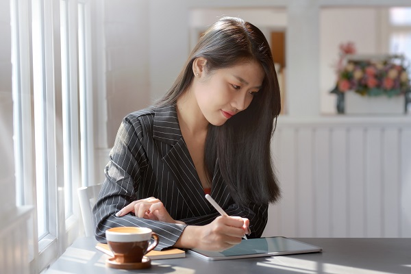 close up of someone writing notes