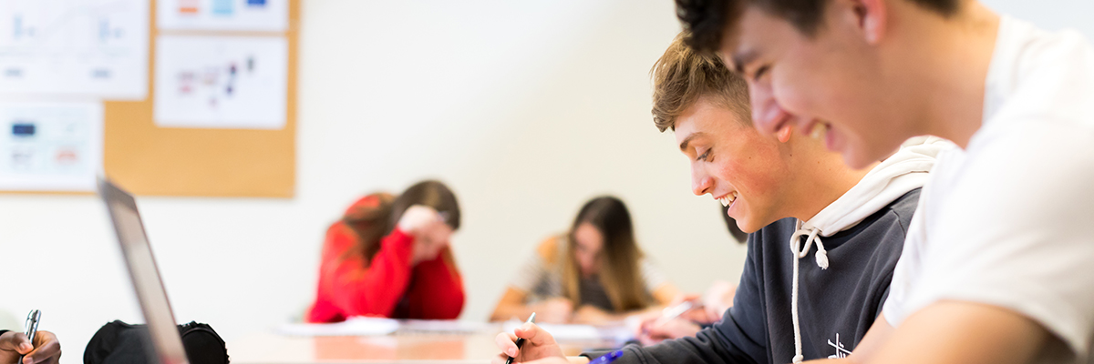 a class of students working