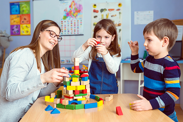 children playing with building blocks