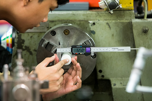 close up of measuring something in the engineering workshop