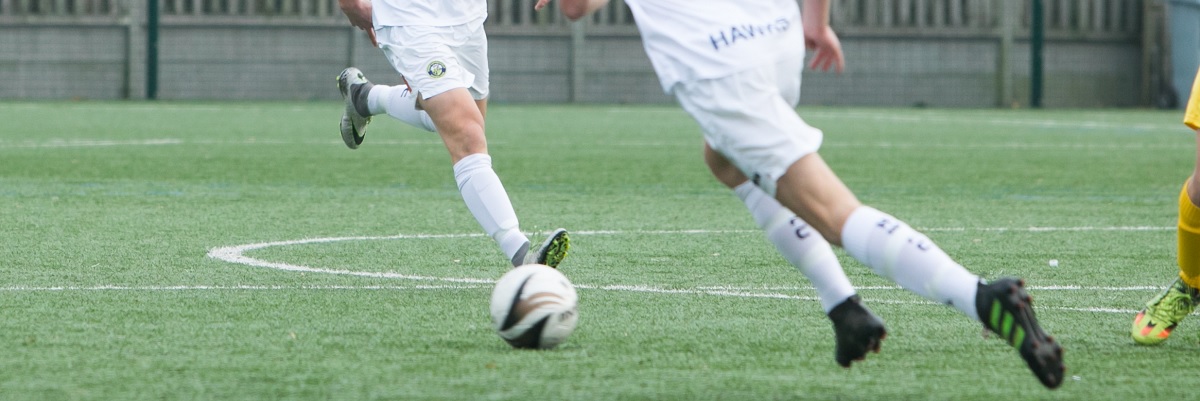 two students playing football