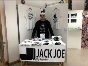 Jack harris displaying his shop products