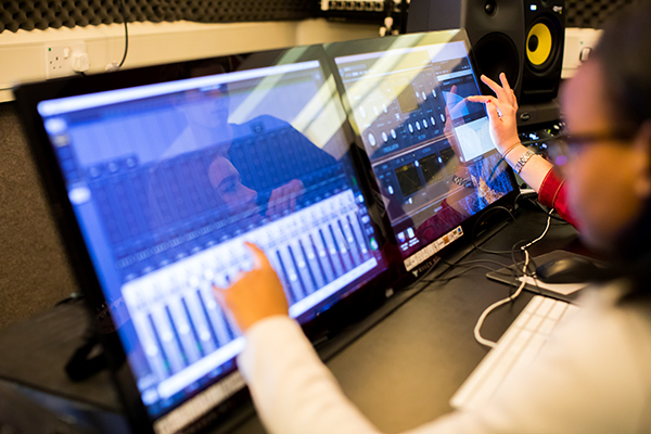 students using music tech equipment