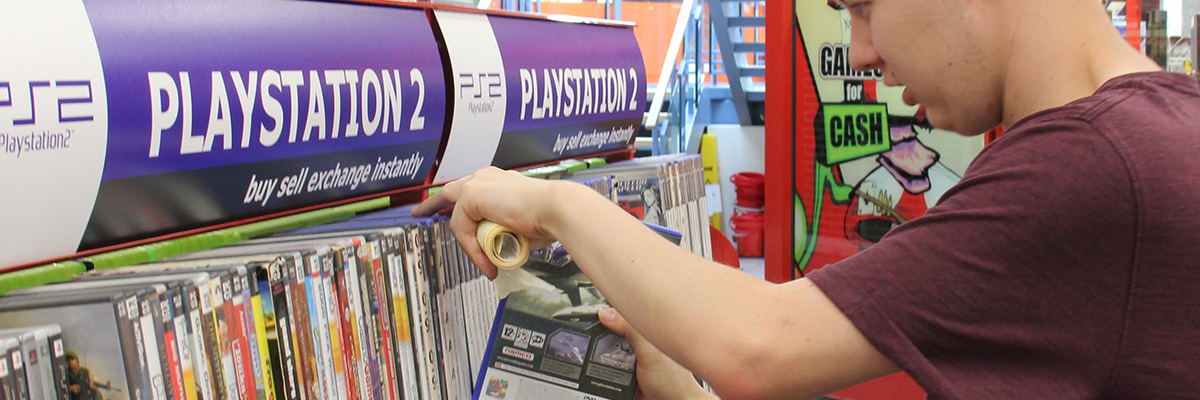 skills for independence and work student working in a game store