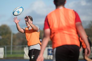 students playing rugby