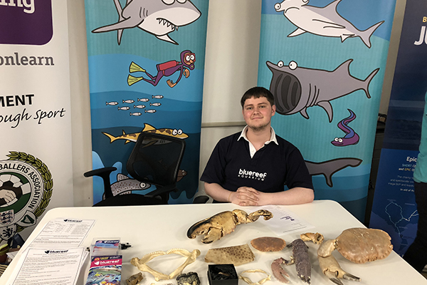 supported internship student sitting at a table
