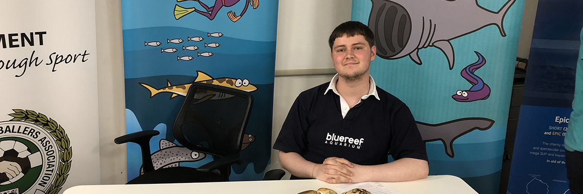 supported internship student sitting at a table