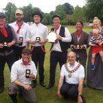 staff team at Victorian Cricket competition with awards
