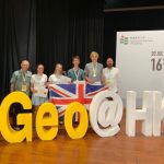 TeamUK places third in the world at iGeo standing for their photograph taken