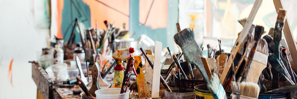 pots of paint brushes