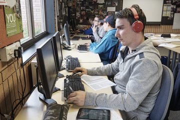 students working at computers