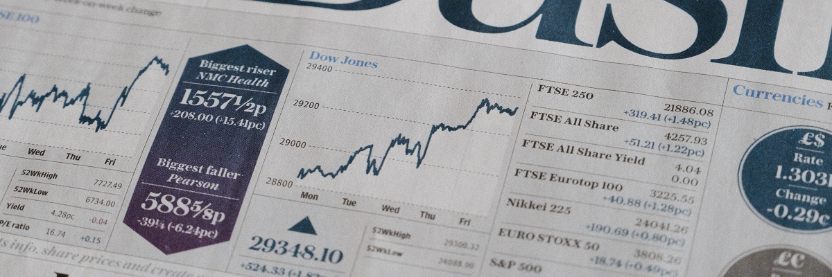 close up of economics newspaper