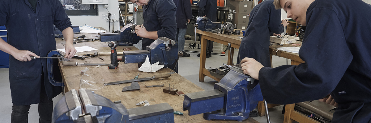 students working in engineering workshop
