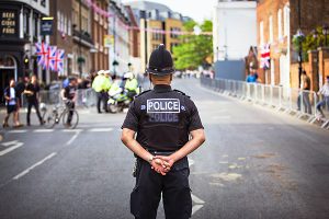 a policeman standing in a road