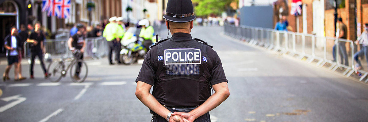 policeman standing in a road