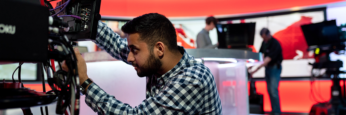 man working in a tv studio