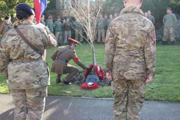 Major Dave Love laying wreath