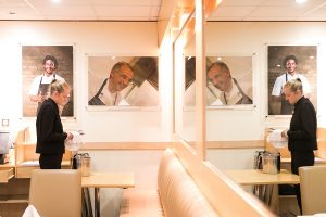 female hospitality student polishing cutlery