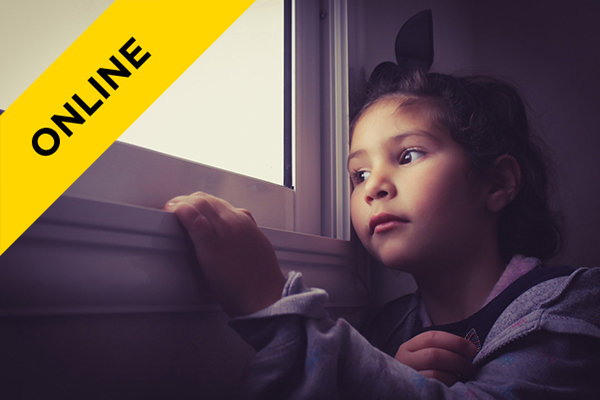 a young child looking out of a window
