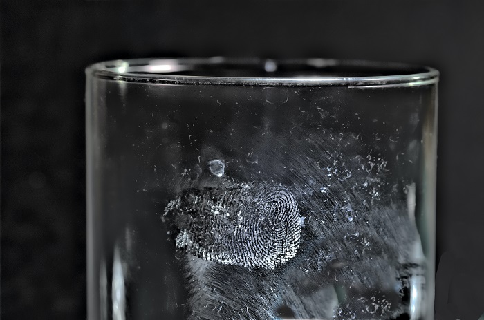 a finger print on the side of a glass