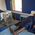 Patient simulators laying on hospital beds