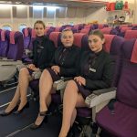 Toni, Zara and Faith sat in the HSDC airplane in their uniforms