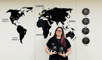 hsdc engineering apprentice Charley Curtis holding her Apprenticeship awards