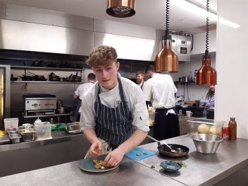 Jack Breach working in the kitchen of the Queens Hotel