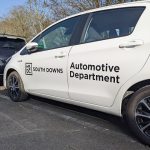 White car with HSDC South Downs Automotive Department on the side