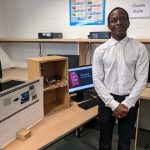 Charlie Dube with his light-up shelf