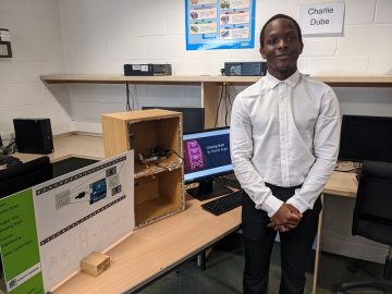 Charlie Dube with his light-up shelf