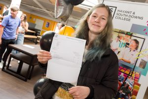 Hayley smiling with her results