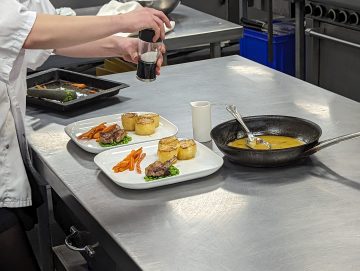 Students preparing their dishes