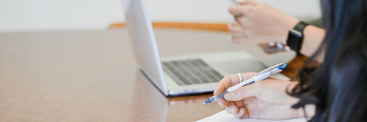 accounting student working on laptop