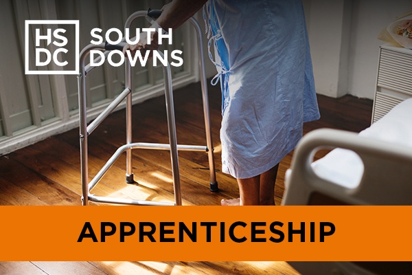 an elderly person using a zimmer frame