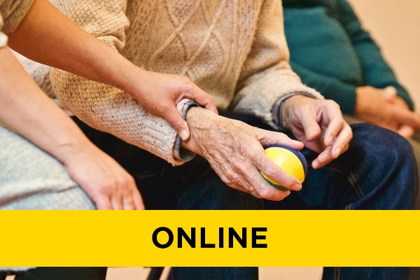 close up of an elderly person doing physical therapy and someone holding their hand