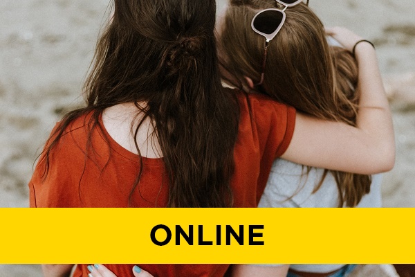 Two people with their arms around eachother.