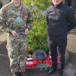 Josh Wiles & Sam Game standing by the memorial tree.